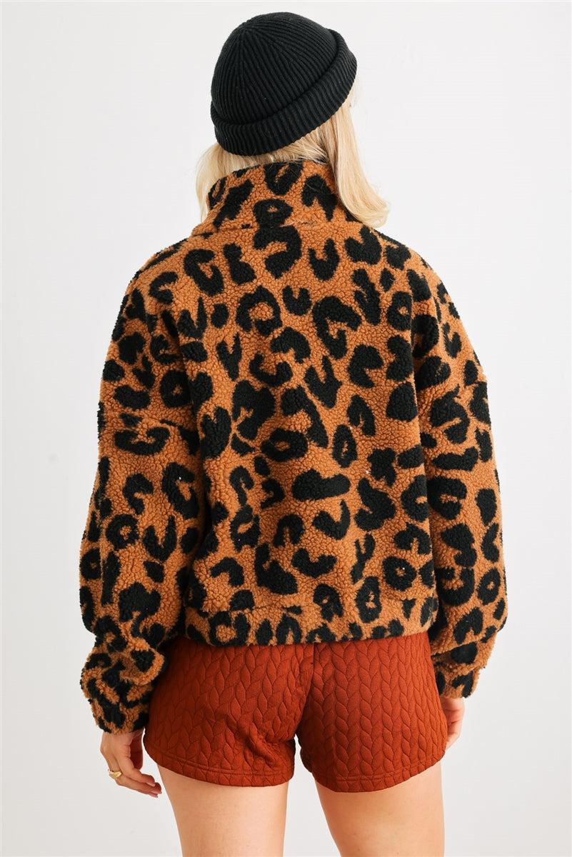 Leopard print teddy jacket with turtle neckline and two pockets, cozy and stylish, perfect for casual wear.