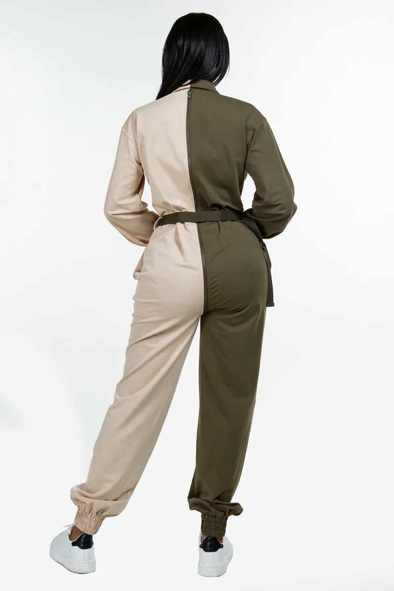 Olive and beige long sleeve oversized cozy shirt jumpsuit with accent belt, rear view, adjustable zipper detail, polyester cotton blend.