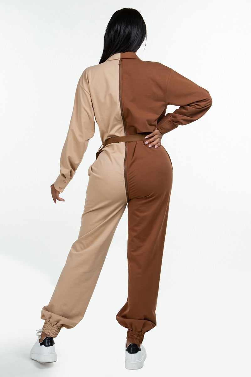 Brown and beige long sleeve oversized cozy shirt jumpsuit with accent belt and adjustable front zipper, rear view.