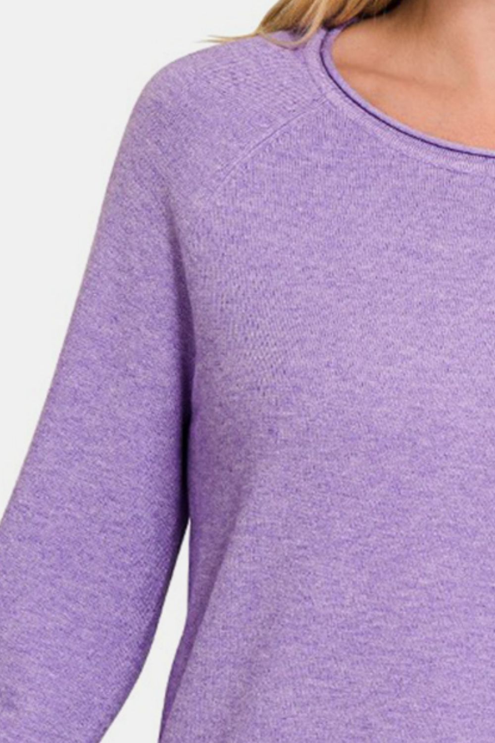 Purple rolled round neck long sleeve sweater with moderate stretch made from 50% viscose, 28% nylon, and 22% polyester.