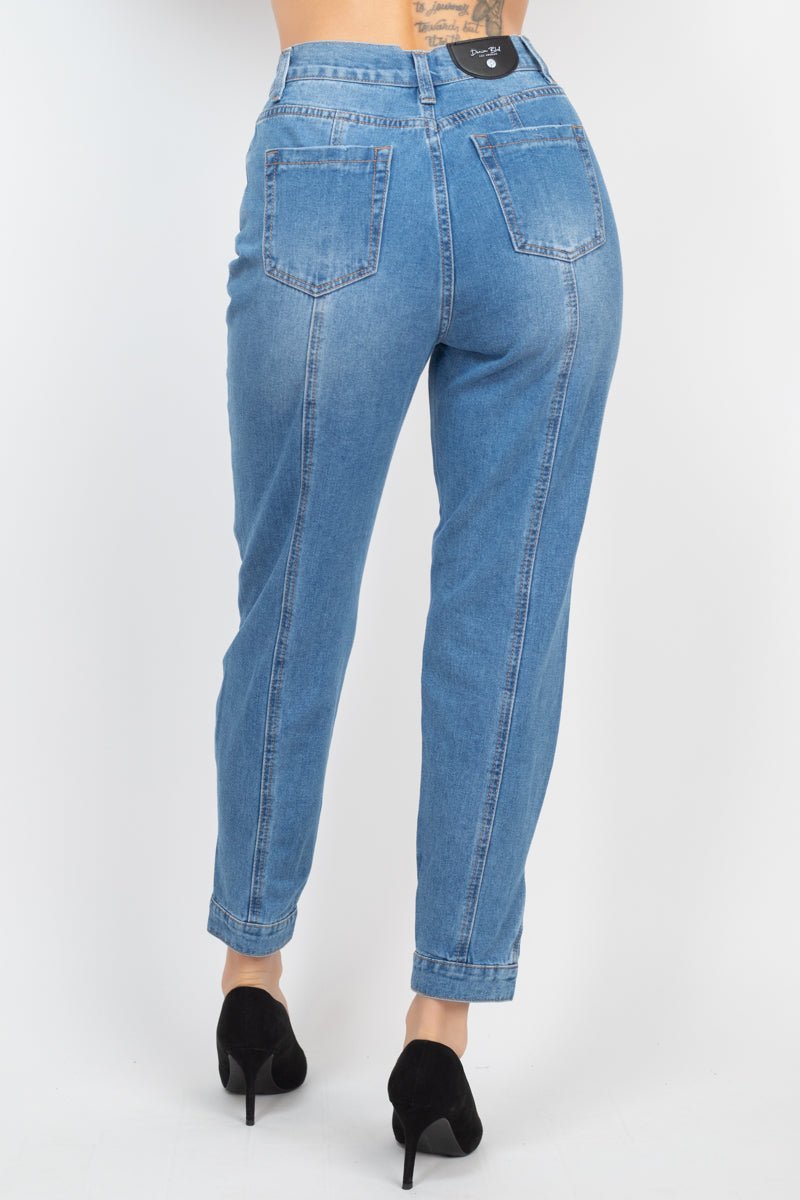 High-rise medium denim mom jeans with cuffed-button hem and princess seams detail, featuring a five-pocket design.