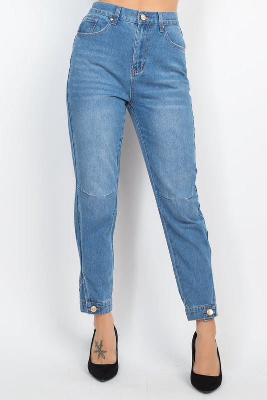 High-rise cuffed-button mom jeans with Capri-length, five pockets, princess seams, in medium denim for a chic look.