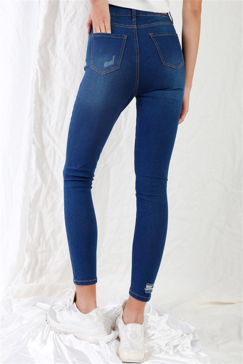 Dark blue high-waisted skinny jeans with five-pocket design, subtle rips, contrast stitching, and stretchy fit, ideal for casual wear.