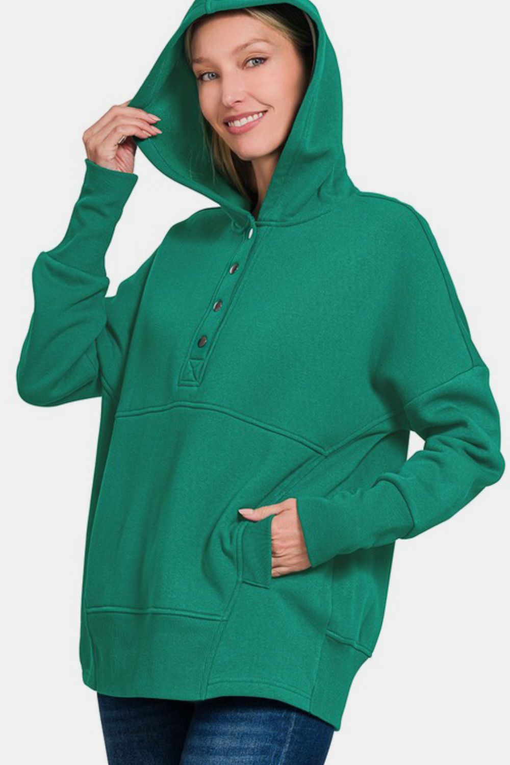 Dark green half snap long sleeve hoodie with kangaroo pocket, featuring a ribbed design and slight stretch for comfort.