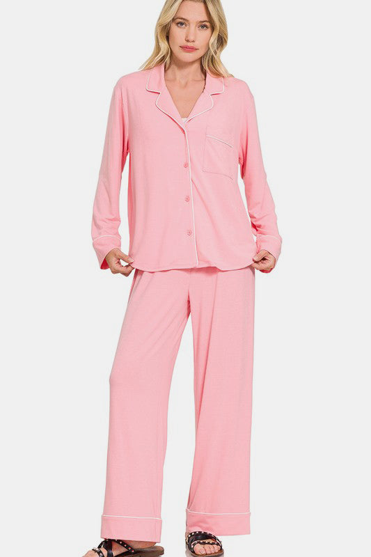 Pink button-down long sleeve lounge set with pants, featuring pockets, slightly stretchy fabric, perfect for cozy relaxation.