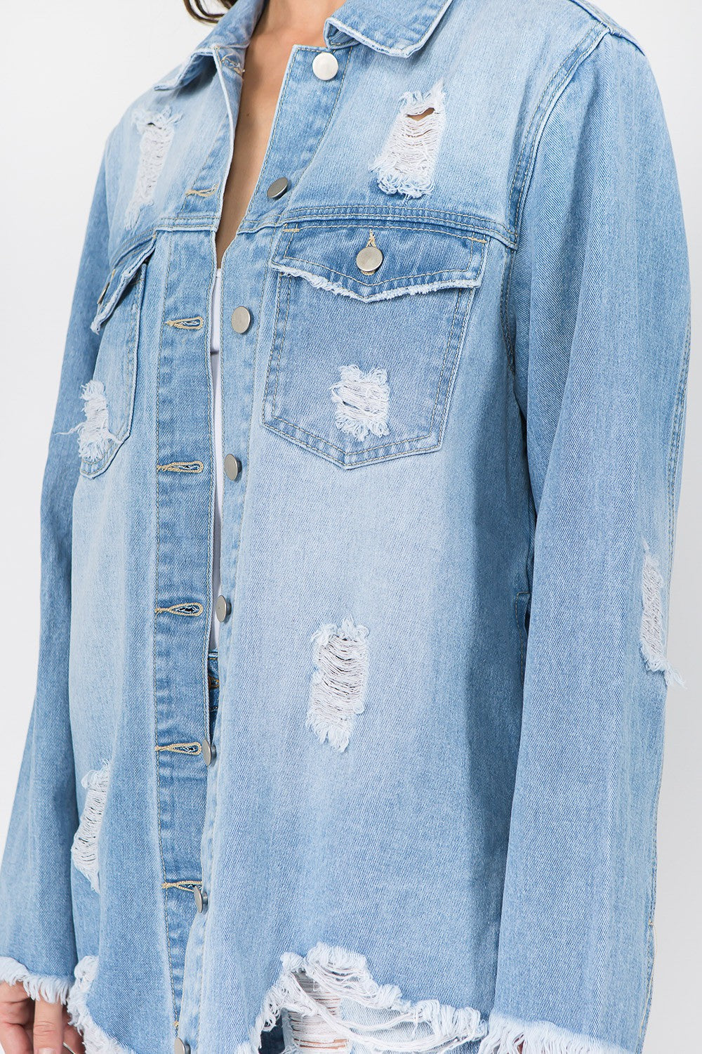 Distressed frayed hem denim jacket with raw hem and vintage-inspired look, featuring button closure, ideal for casual outings