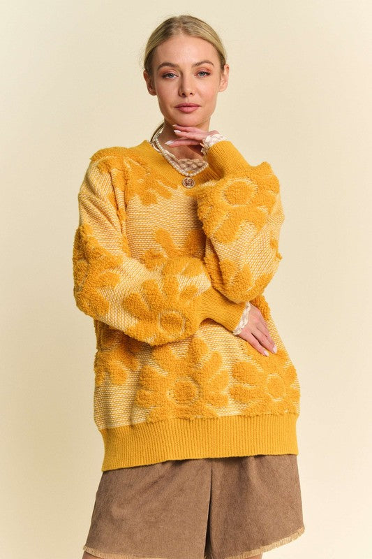 Gold flower texture round neck sweater with dropped shoulders, slightly stretchy, made from 100% polyester.