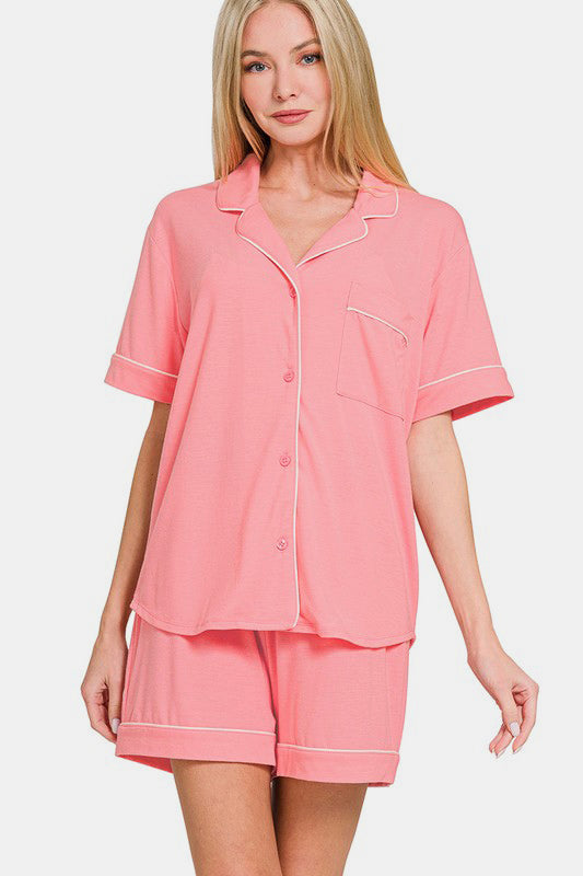 Dark pink button down short sleeve lounge set with shorts, featuring a pocketed top, slightly stretchy fabric for comfort.