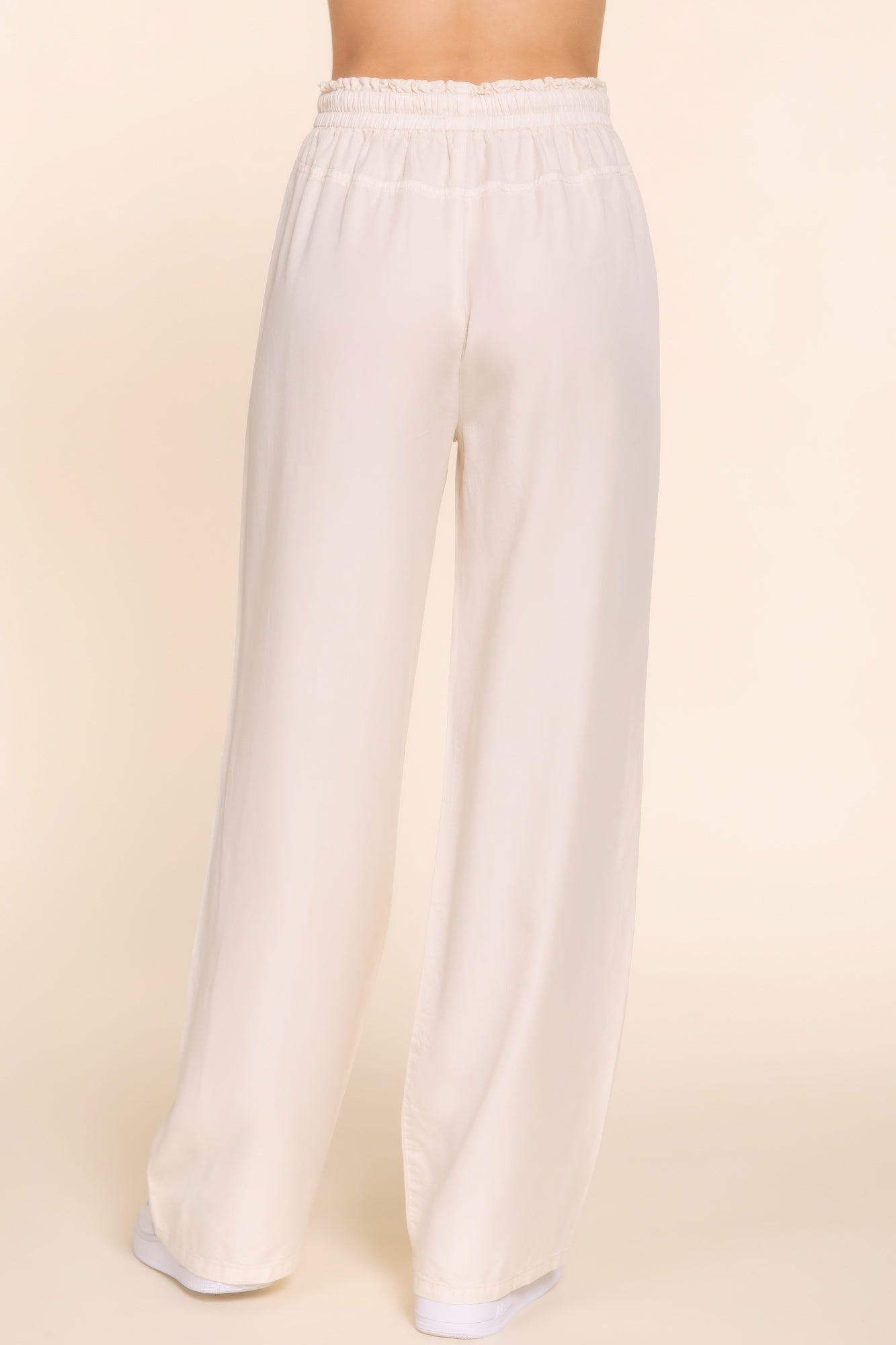 Elegant elastic waist Tencel long pants in classic solid color showcasing modern comfort and versatility for everyday wear