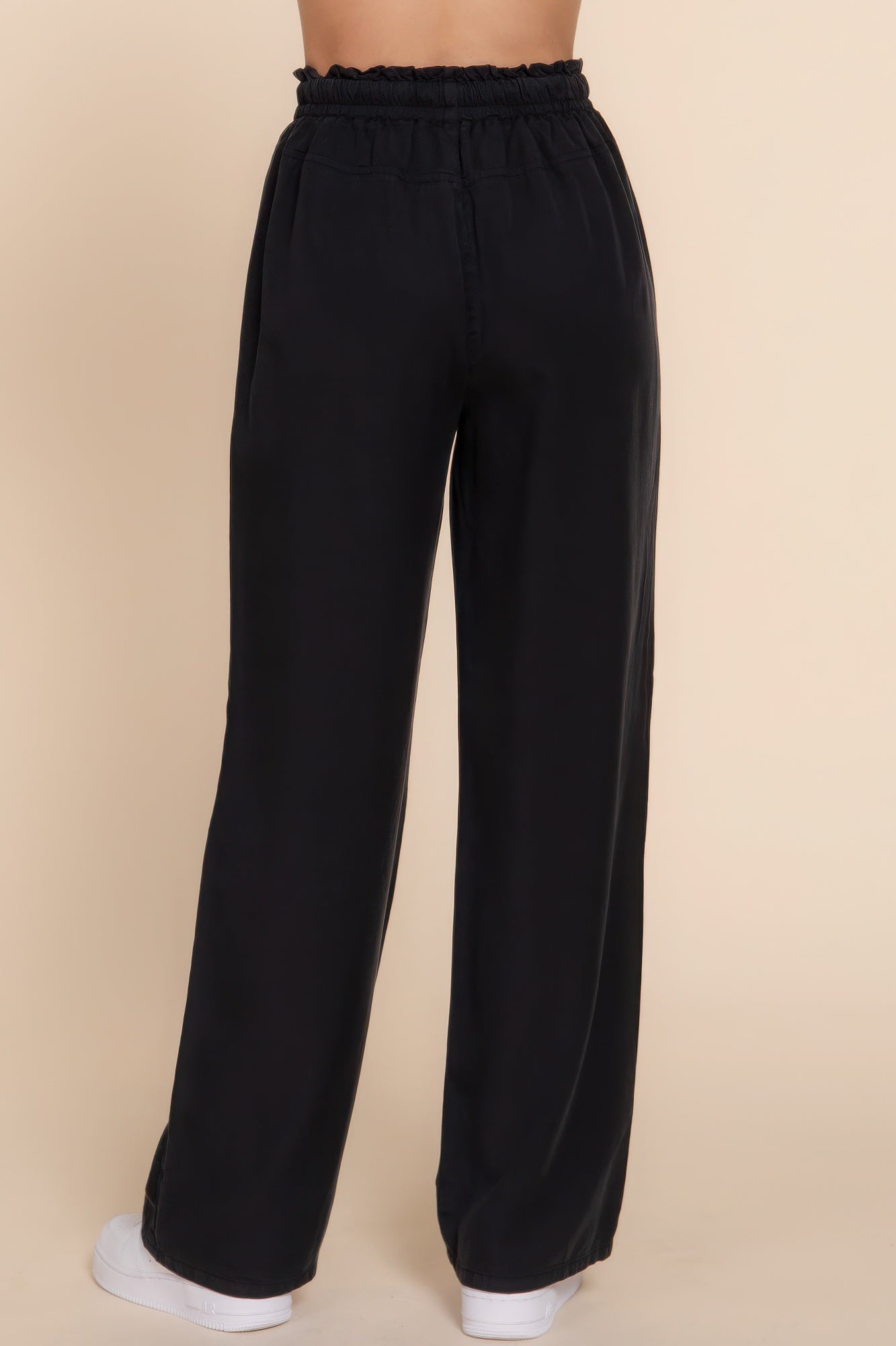 Elastic waist Tencel long pants in black showing back view with comfortable fit and versatile design for everyday wear