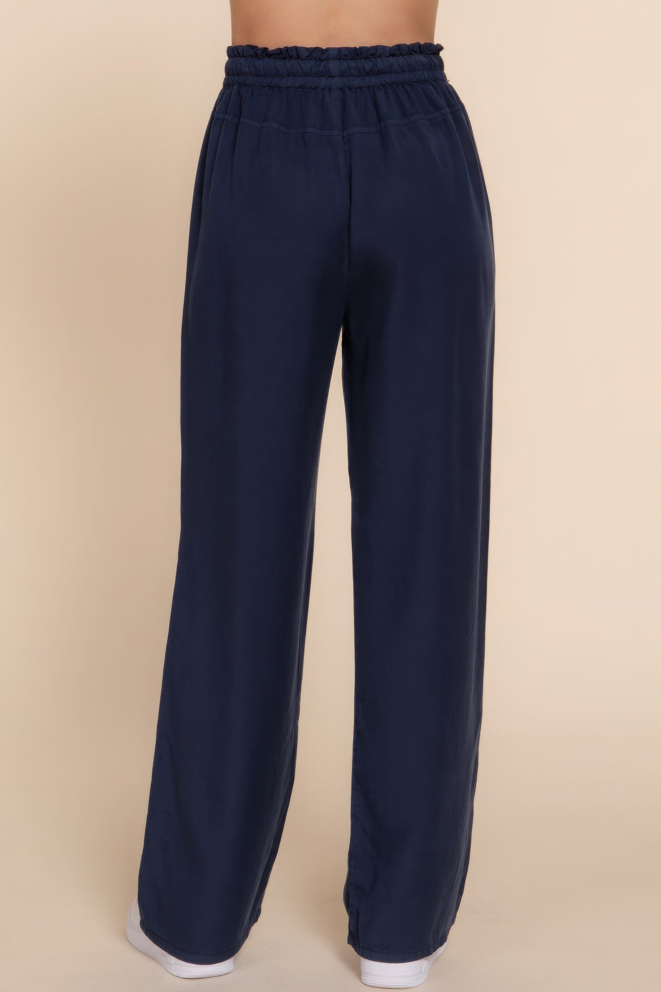 Elastic waist Tencel long pants in navy, showcasing back view and soft, breathable fabric for versatile, everyday wear.