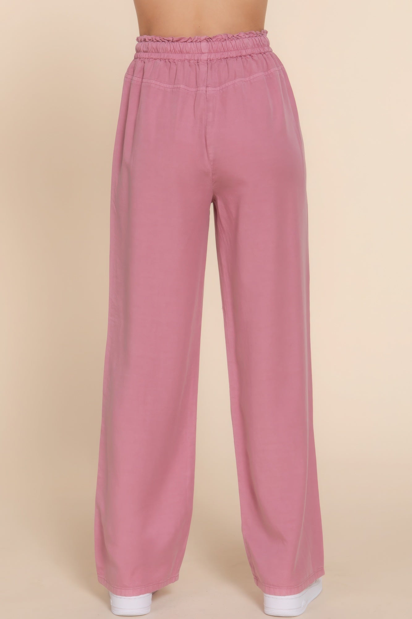 Pink elastic waist Tencel long pants for women, shown from the back, offering a comfortable and stylish fit for everyday wear.