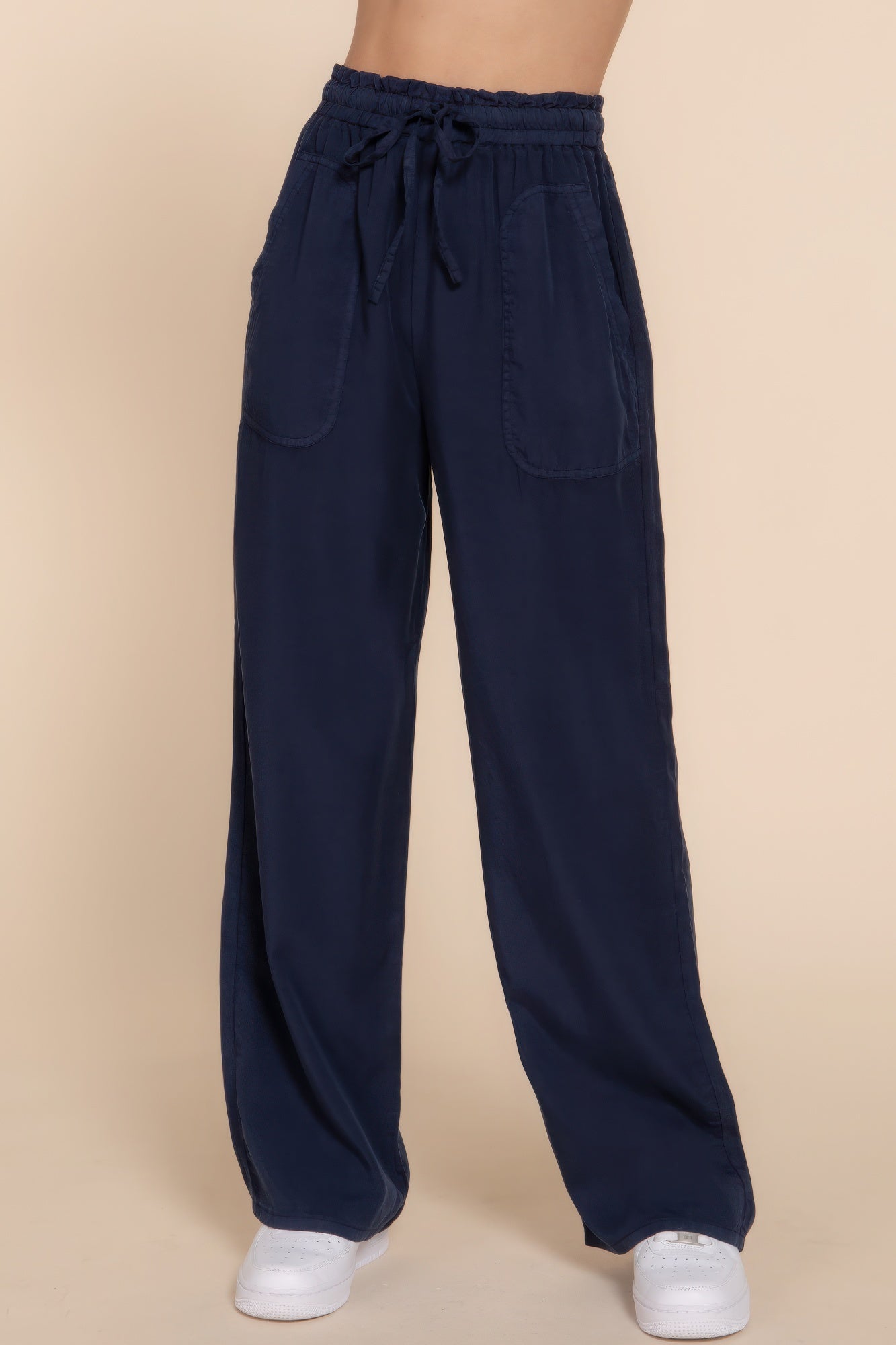 Navy blue elastic waist Tencel long pants for women, featuring a comfortable fit and versatile style for everyday wear.