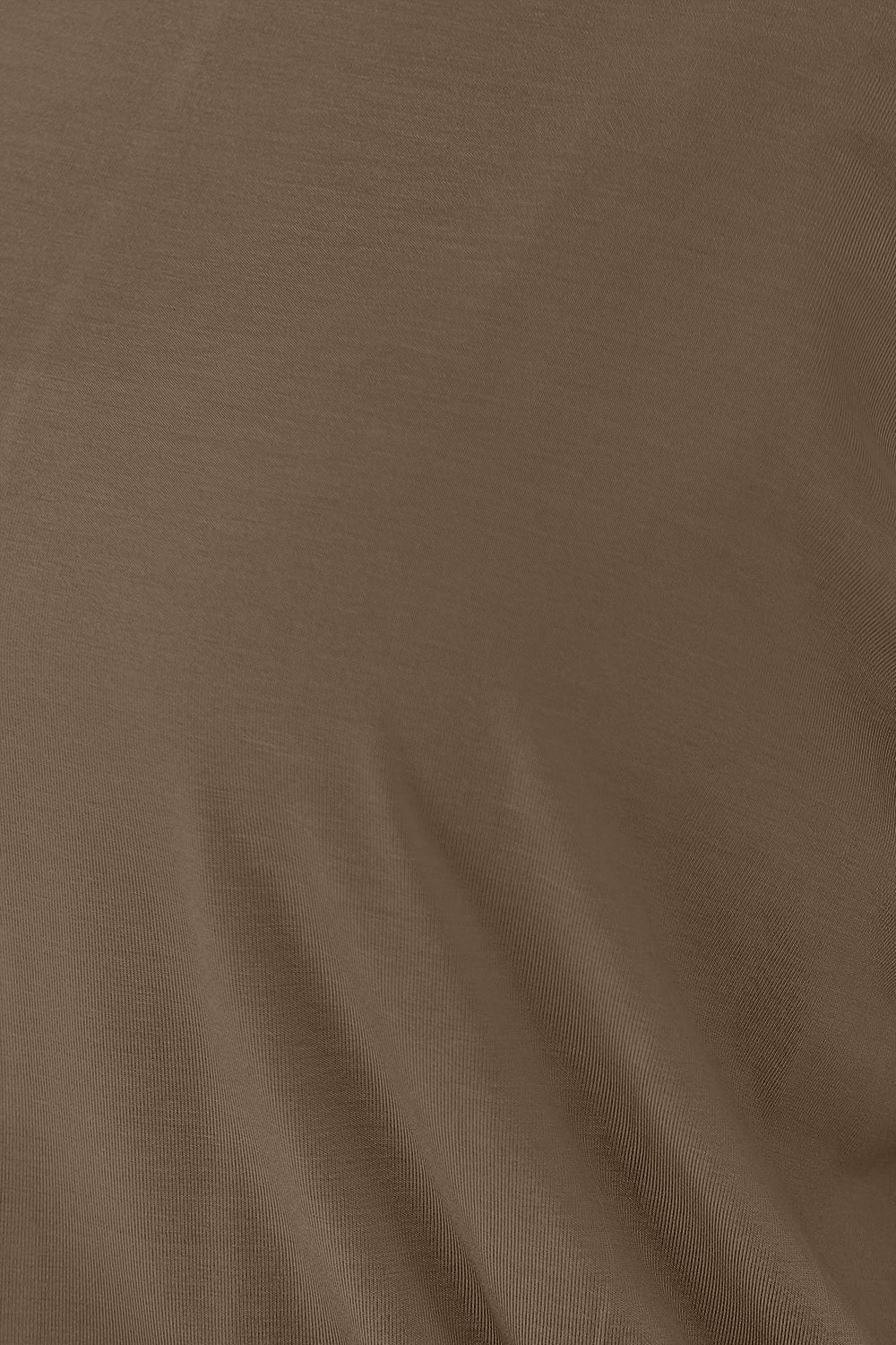 Close-up of brown fabric texture of Round Neck Batwing Sleeve Top showing the smooth rayon and spandex blend.