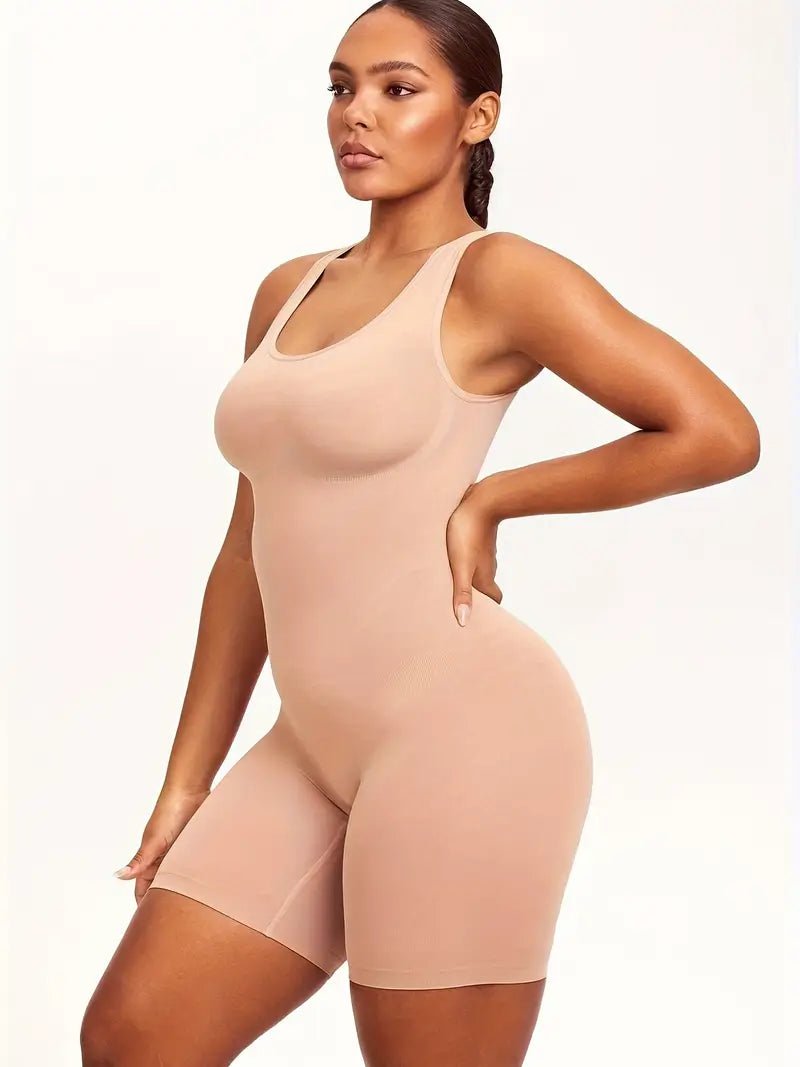 Woman wearing an elegant stretch fit knit bodysuit, showcasing slim fit silhouette and abdominal control for a flattering look.