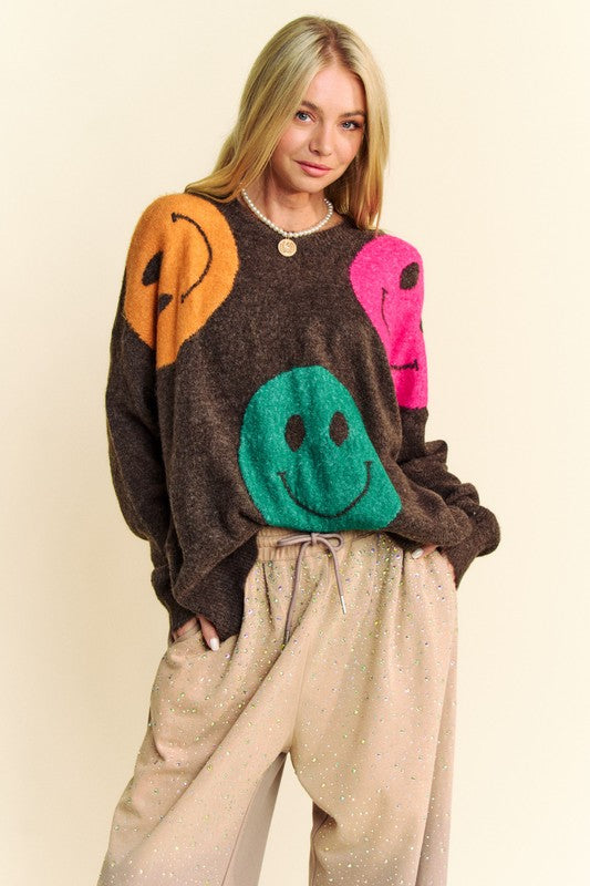 Contrast smiley face round neck oversize sweater with colorful designs, slightly stretchy, made from acrylic, polyester, spandex.