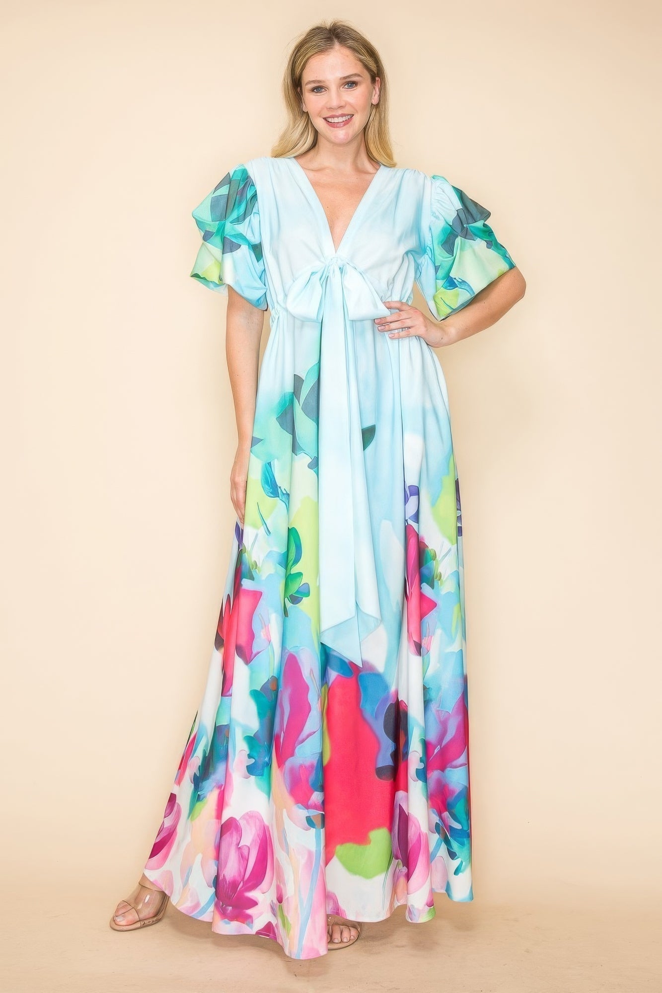 Vibrant multi-color printed V neck maxi dress with self-tie ribbon and flowy skirt, perfect for casual outings or beach vacations.