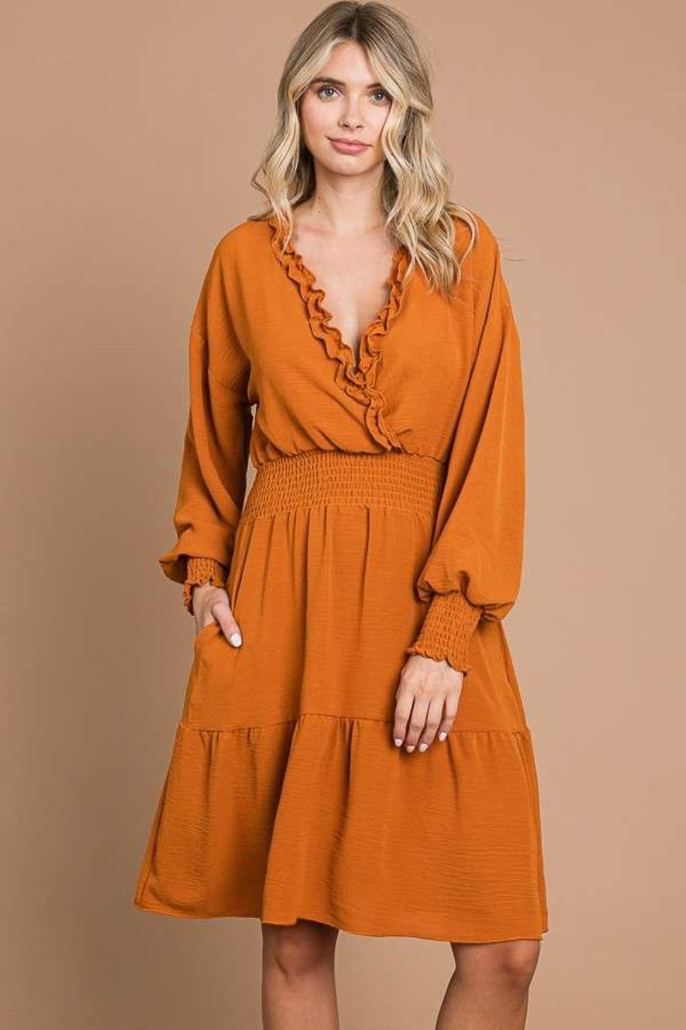 "Frill Smocked Lantern Sleeve Mini Dress in orange polyester with highly stretchy fabric and elegant design"