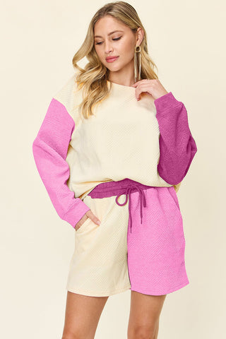 Full Size Contrast Drop Shoulder Top and Shorts Set with pockets and drawstring, two-piece slightly stretchy polyester spandex blend