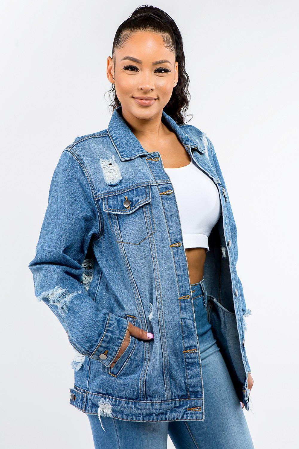 Full size distressed denim jacket, women's fashion, edgy and versatile styling with durable cotton blend, perfect for layering.