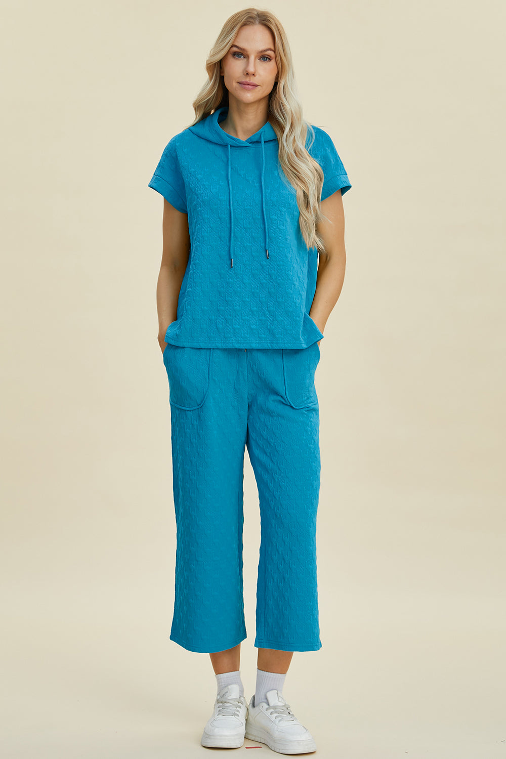 Full size texture short sleeve hoodie and pocketed pants set in blue, featuring drawstring and slightly stretchy material.