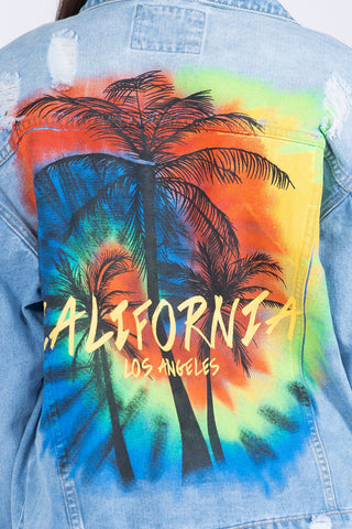 Trendy denim jacket with colorful painted palm tree design and California Los Angeles text, perfect for casual weekend style.