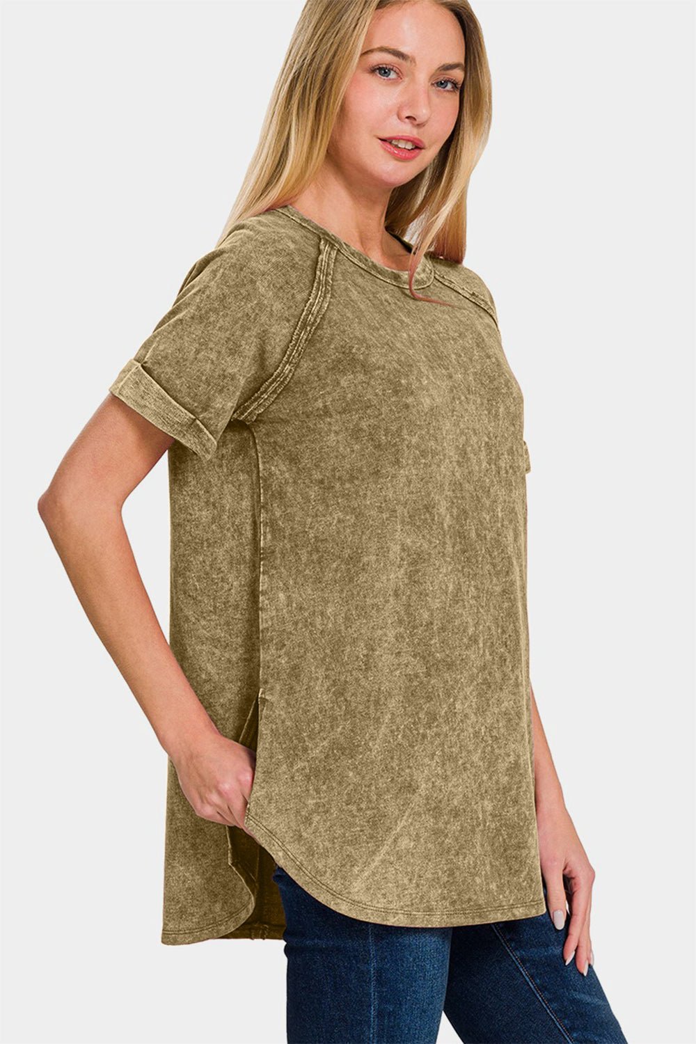 Woman wearing a heathered round neck short sleeve top, 100% cotton, moderate stretch, basic style, ideal for casual wear.