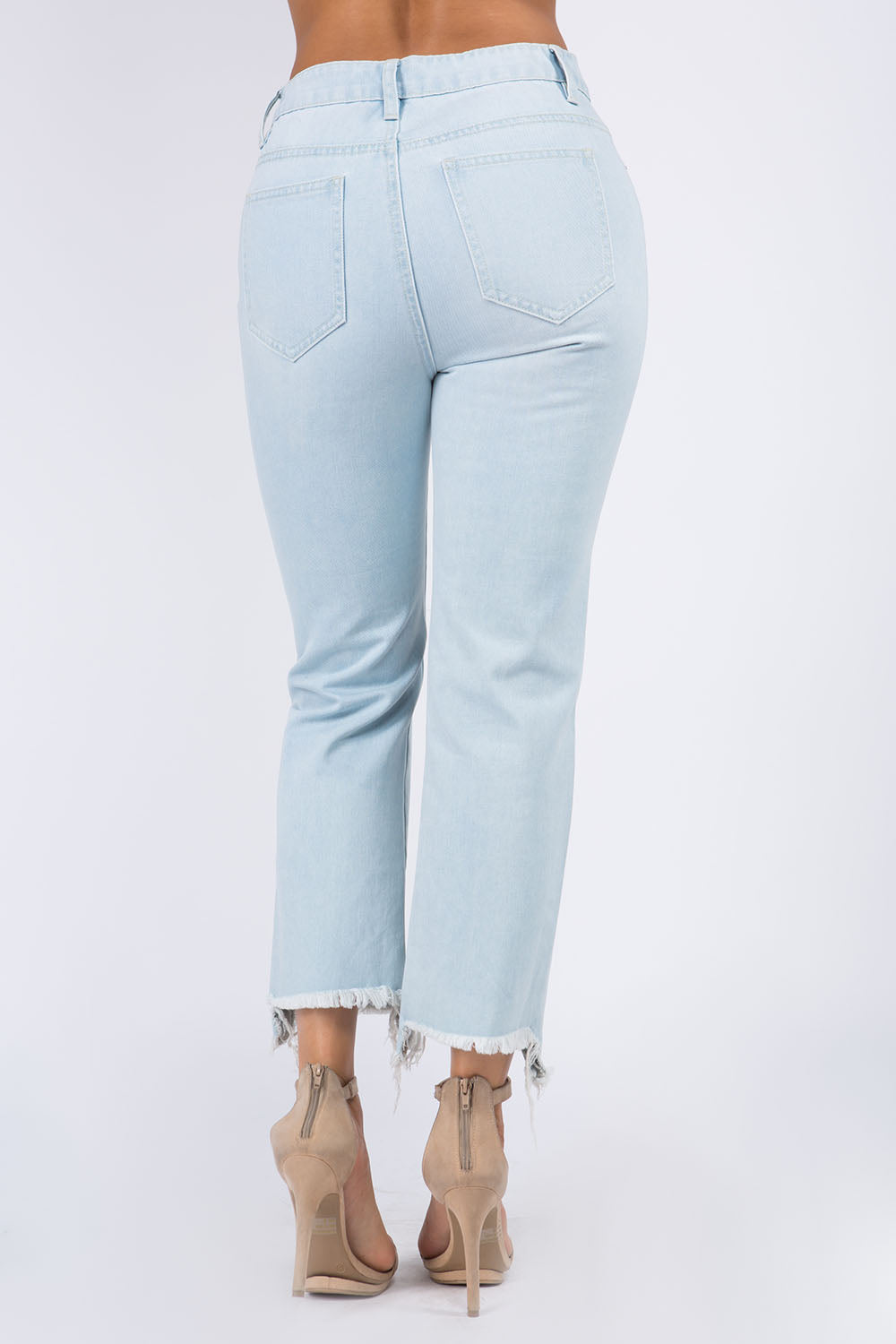 High Waist Distressed Raw Hem Jeans in light blue with functional pockets and frayed edge, perfect for casual outings and vintage style lovers.