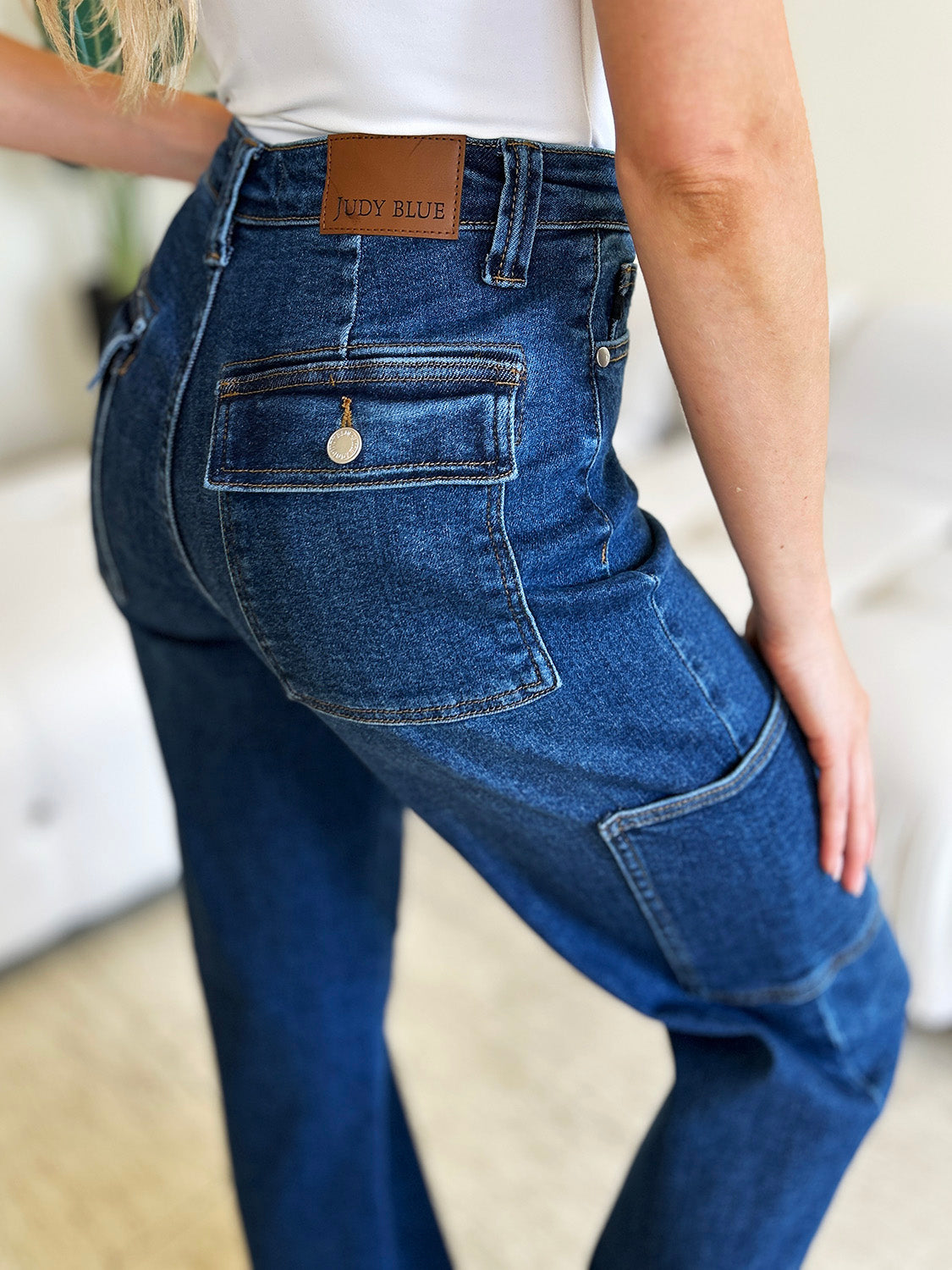 High Waist Straight Cargo Jeans with pockets in washed denim, featuring slightly stretchy material for style and comfort.