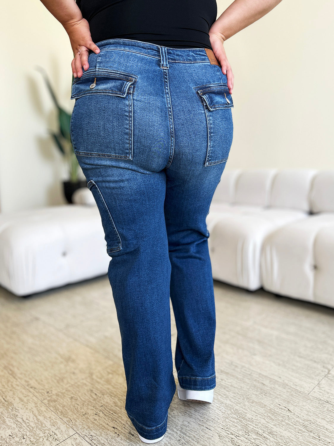 High waist straight cargo jeans with back pockets, slightly stretchy denim, crafted from cotton, polyester, and spandex blend.