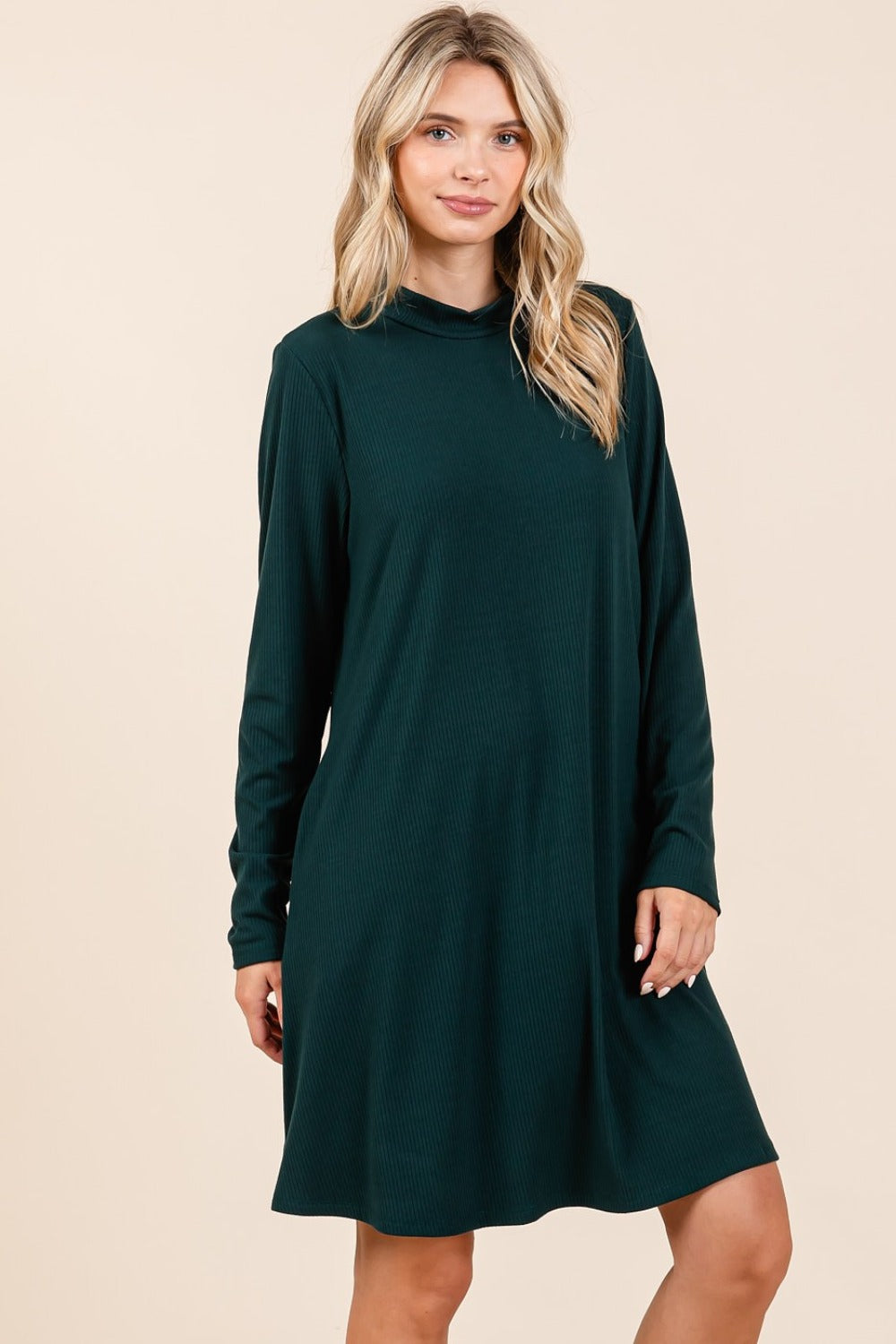 Hunter green mock neck long sleeve dress with pockets, slightly stretchy fabric, elegant design suitable for various occasions.