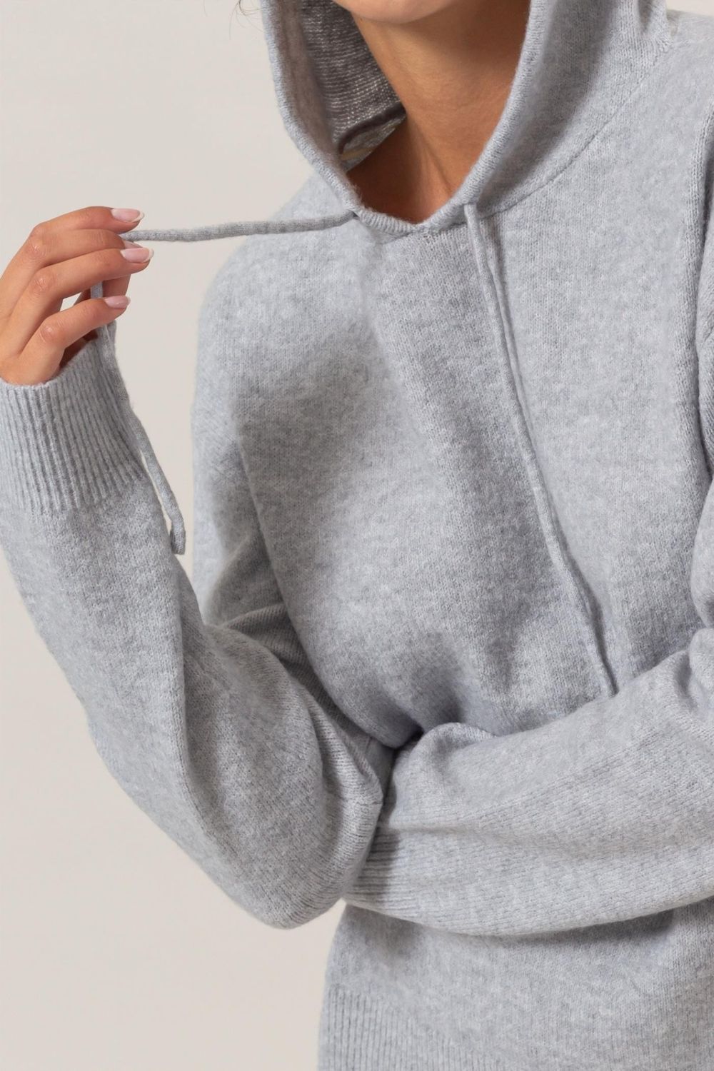 "Gray drawstring long sleeve hooded sweater for cozy layering and sporty style"