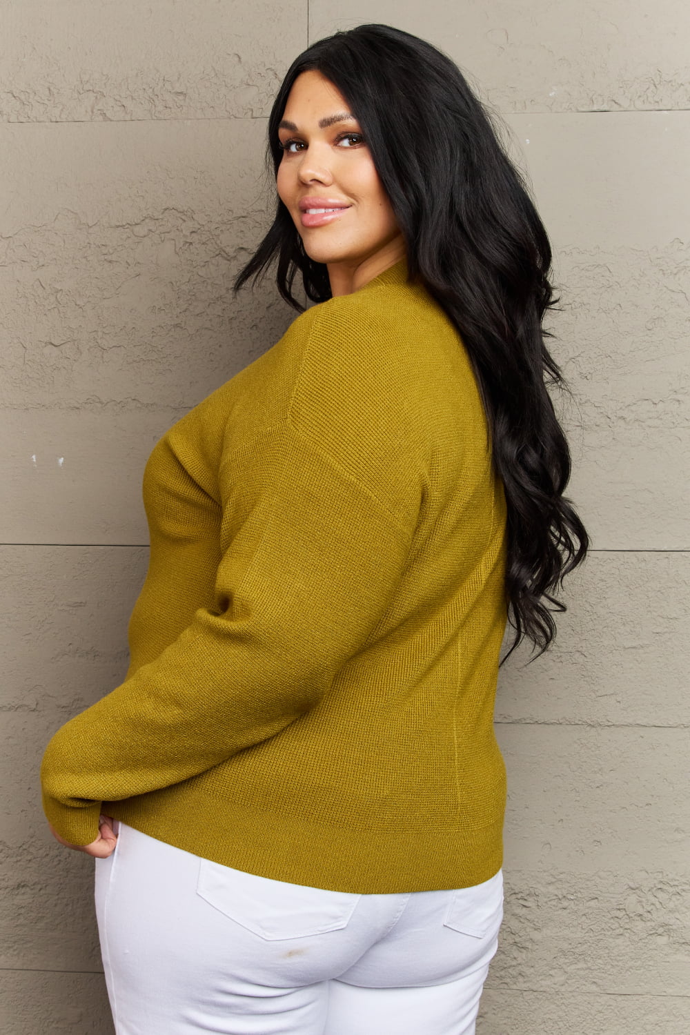 Woman wearing Kiss Me Tonight Chartreuse Cardigan, casual button-down style with long sleeves and a ribbed V-neck.