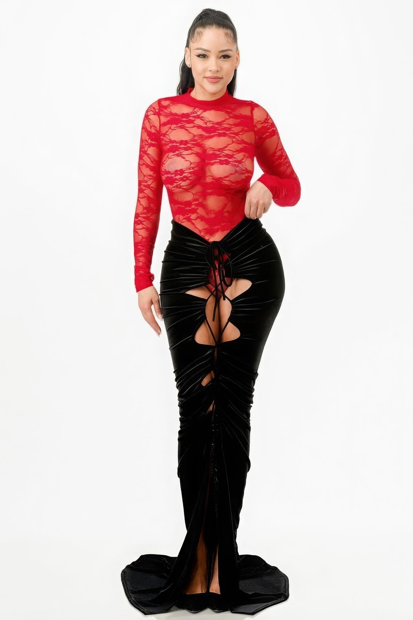 Red lace bodysuit with long sleeves paired with a black stretch velvet mermaid skirt featuring cutouts and adjustable strings.