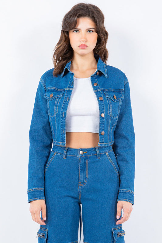 Trendy laced back cropped denim jacket with button accents, ideal for versatile casual or dressy wear.