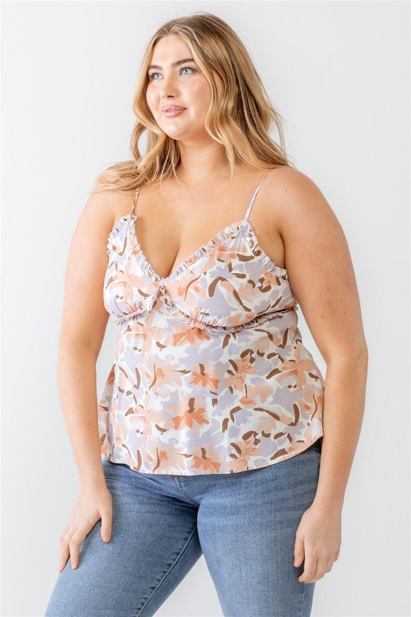 Plus size floral print lavender woven tank top with ruffles, adjustable straps, v-neckline, and back zip, modeled casually.