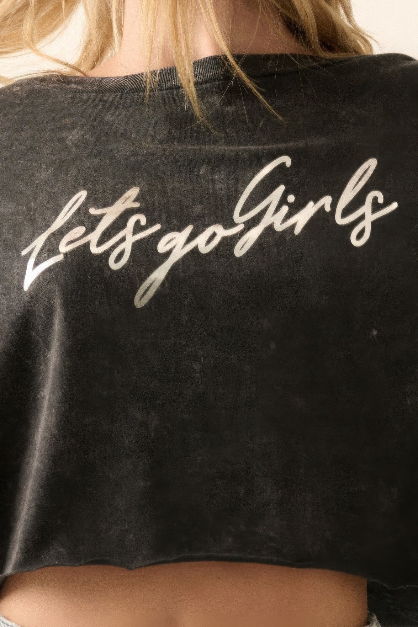 Charcoal gray graphic tee with "Let's Go Girls" metallic text and vintage wash effect.