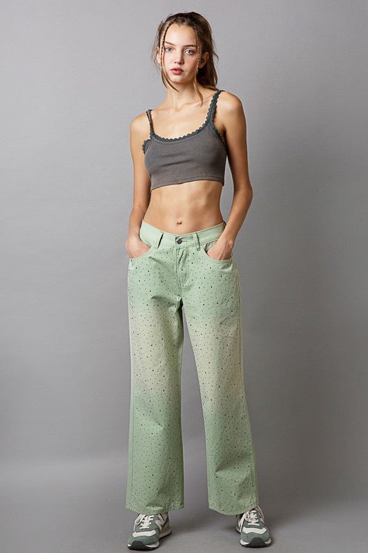 Light green gradient wide-leg pants with rhinestone embellishments and pockets, made of 100% cotton, worn by a model.
