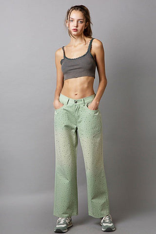 Light green gradient wide-leg pants with rhinestone embellishments and pockets, made of 100% cotton, worn by a model.