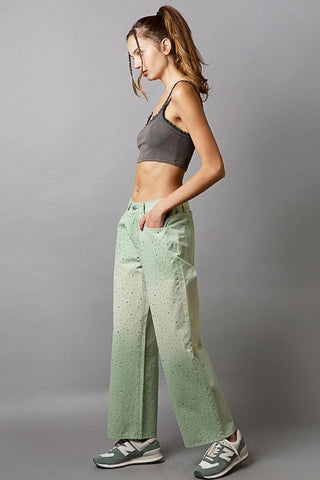 Light green gradient wide leg pants with rhinestone pocket embellishments, 100% cotton, worn by model with gray top.