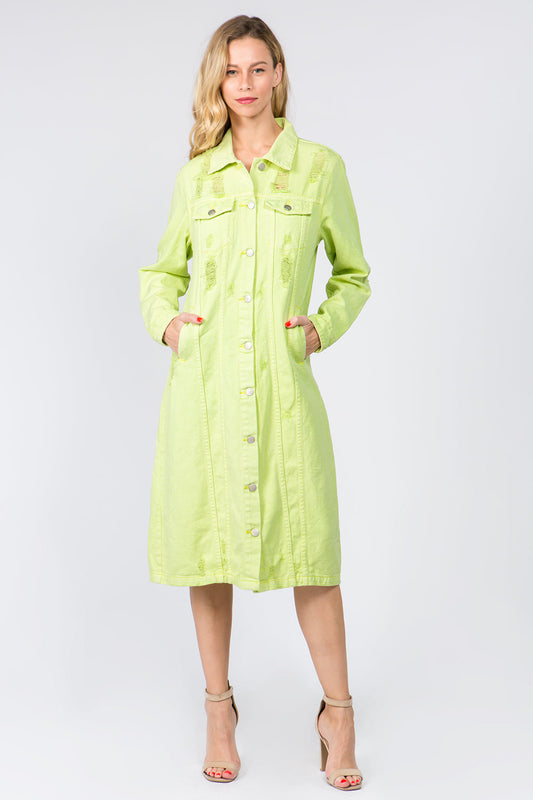 Lime button-up distressed denim dress made of 100% cotton with long sleeves and pockets, worn by a model.