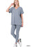 Woman wearing gray Lounge Around Two-Piece Set made of 90% polyester and 10% spandex, perfect for comfort and style.