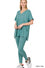 Woman wearing Lounge Around Two-Piece Set in teal, made of 90% polyester and 10% spandex, ideal for comfortable lounging.