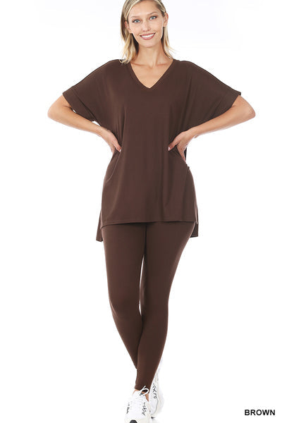 Woman wearing brown lounge around two-piece set with short sleeve top and leggings, made of 90% polyester and 10% spandex.