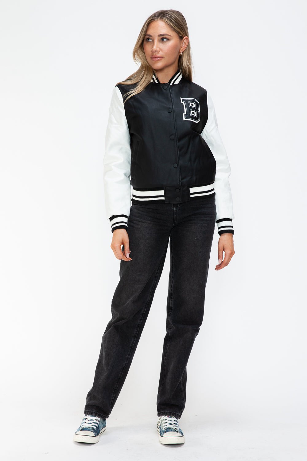 Woman wearing Love PU Leather Contrast Snap Down Bomber Jacket with black and white design.