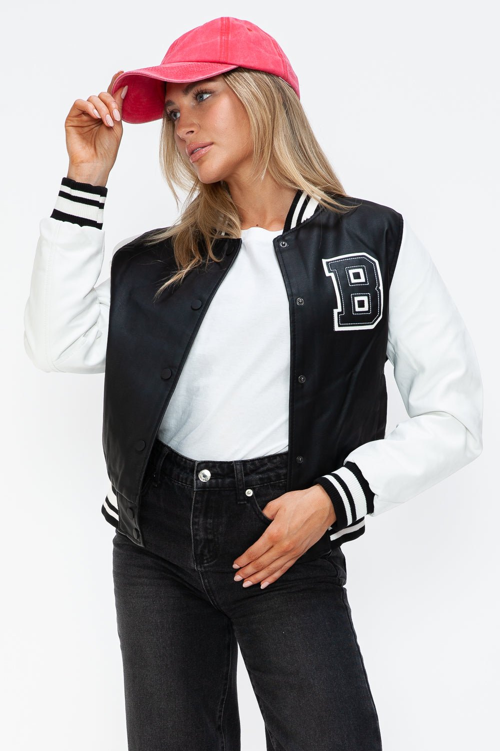 Woman wearing Love PU Leather Contrast Snap Down Bomber Jacket with letter B and pink cap.