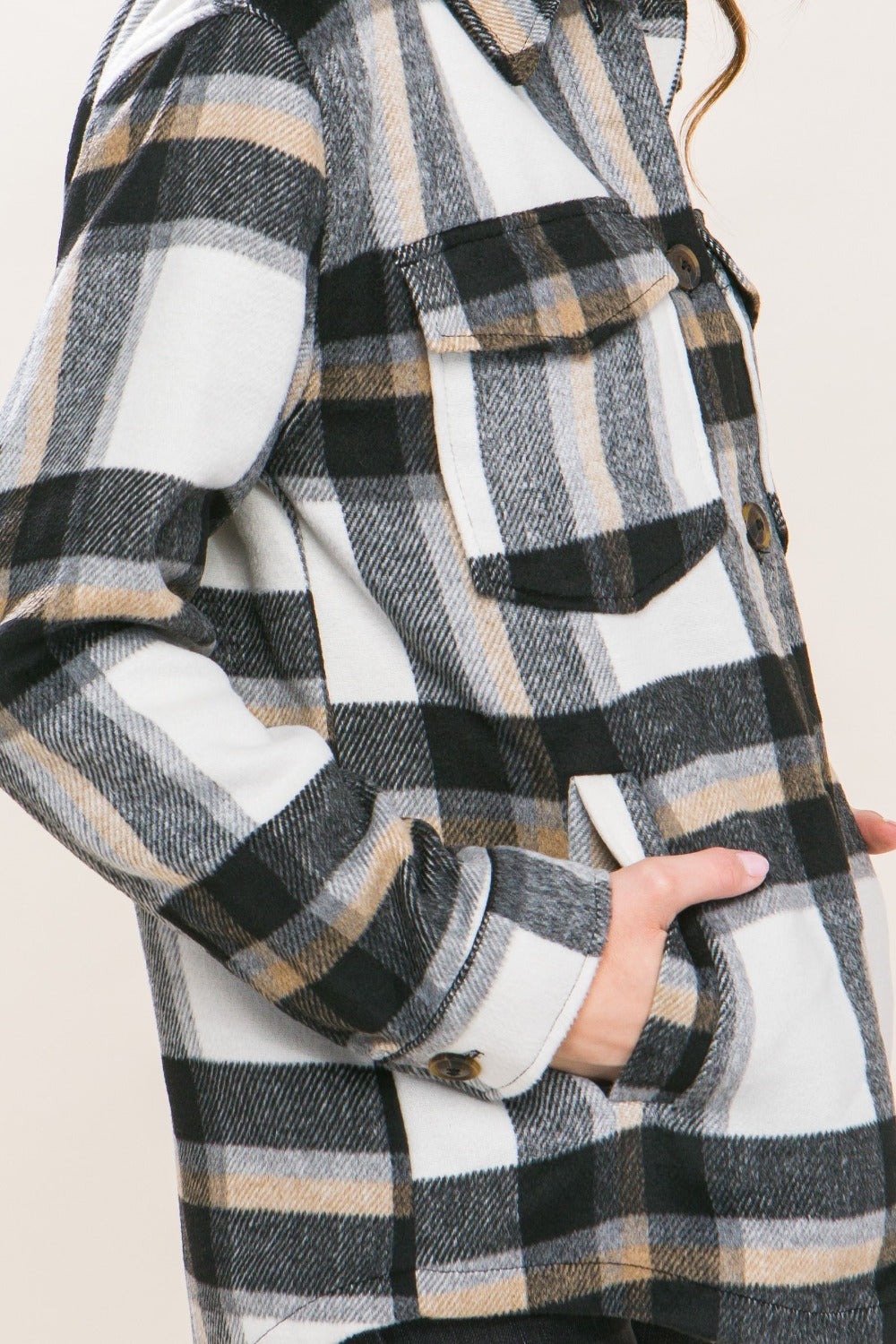 Plaid Button Up Shacket in black and white pattern with pockets and button details, perfect for stylish casual layering.