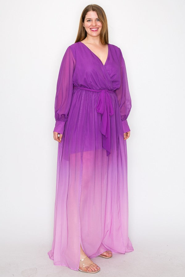 Woman wearing magenta ombre chiffon maxi dress with long sleeves, tie waist, and slit front, perfect for elegant occasions.