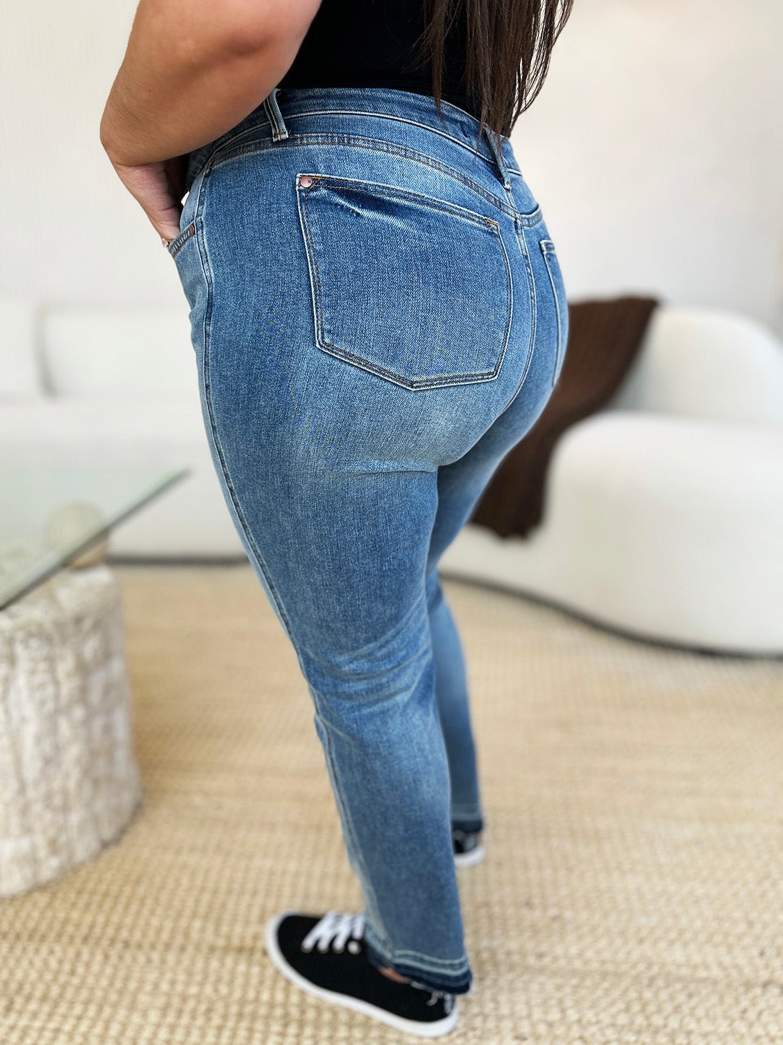 Mid Rise Rigid Magic Release Hem Jeans with moderate stretch, featuring a comfortable and stylish fit, perfect for everyday wear.