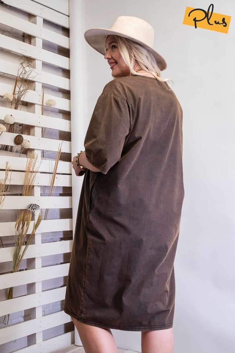 Mineral washed loose fit dress in ash brown, back view. Features boxy, slouchy silhouette with chest and side hip pockets.